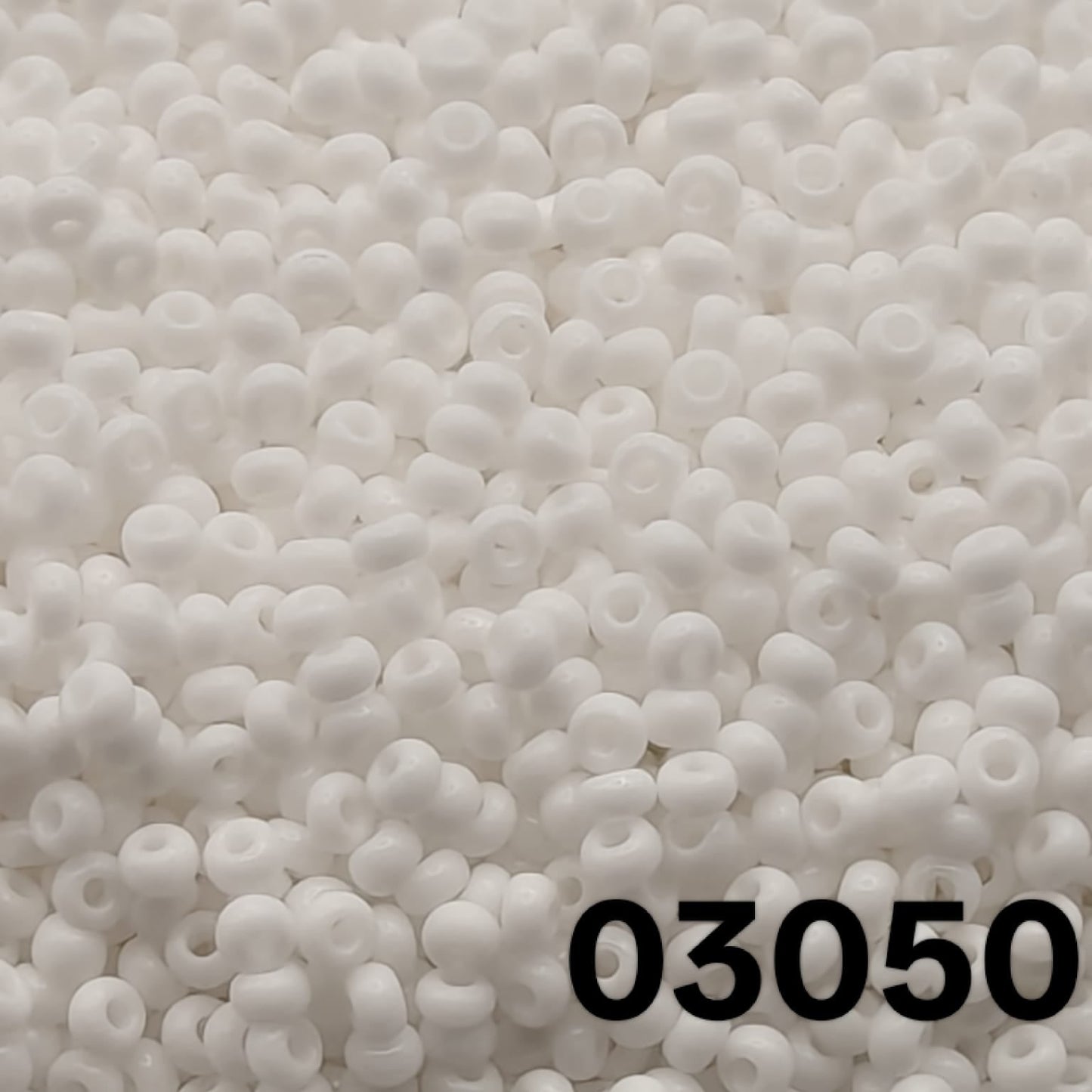 Preciosa 10/0 seed beads 03050 Opaque Matte Chalk White close-up