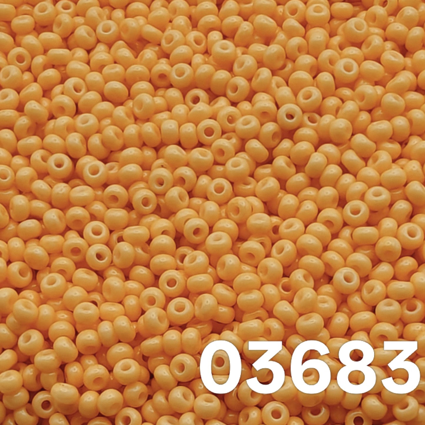 Preciosa 10/0 seed beads Solgel Chalk Orange 03683 close-up