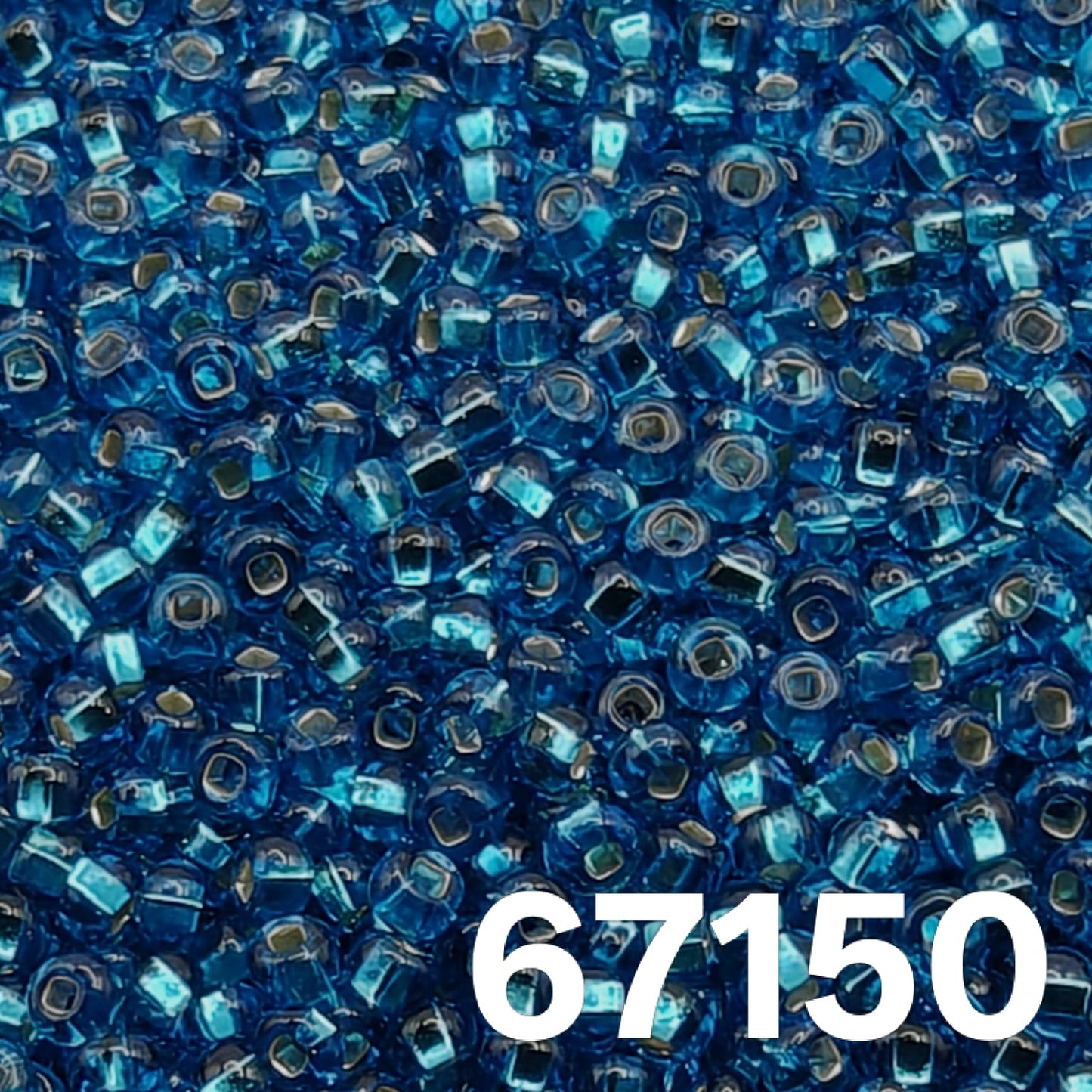 Preciosa 10/0 silverlined Dark Aqua seed beads 67150 in a heap