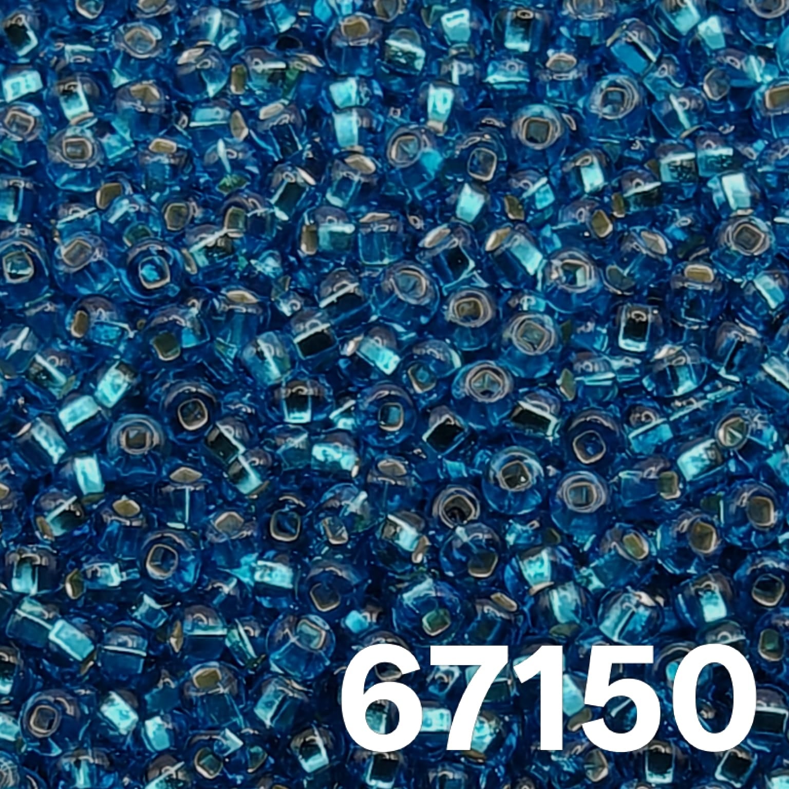 Preciosa 10/0 silverlined Dark Aqua seed beads 67150 in a heap