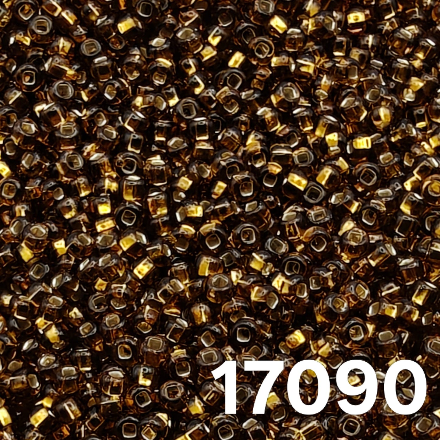 Preciosa 10/0 silverlined brown seed beads 17090 — close-up of round Czech glass beads with golden sparkle.”