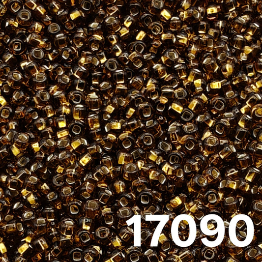Preciosa 10/0 silverlined brown seed beads 17090 — close-up of round Czech glass beads with golden sparkle.”