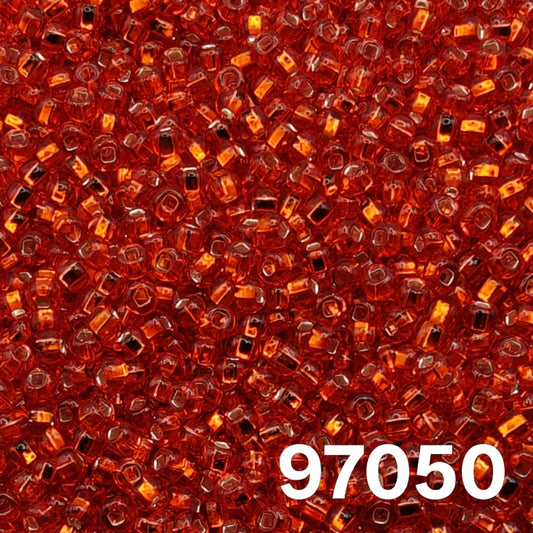 Preciosa 10/0 silverlined light red seed beads, square hole, colour 97050 close-up