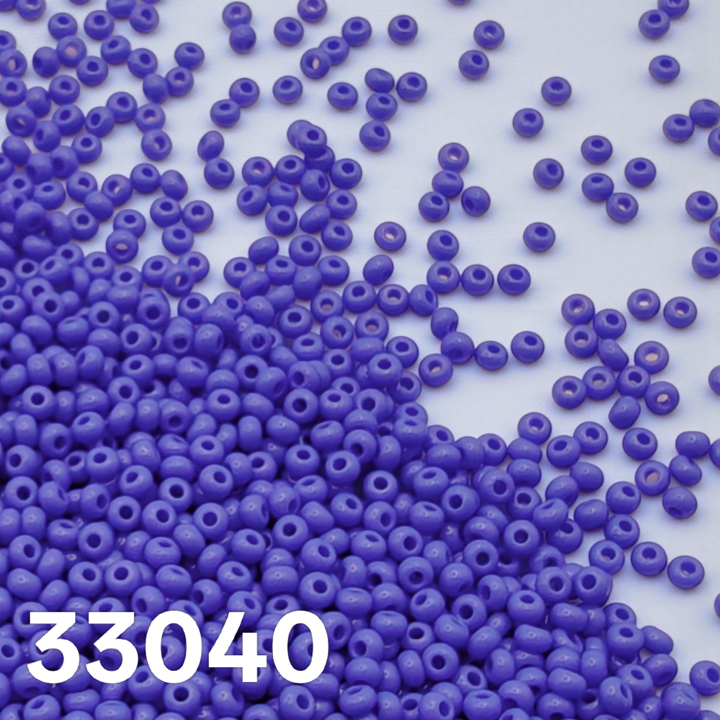 Preciosa 33040 medium blue opaque beads for bead weaving and embroidery, flat lay