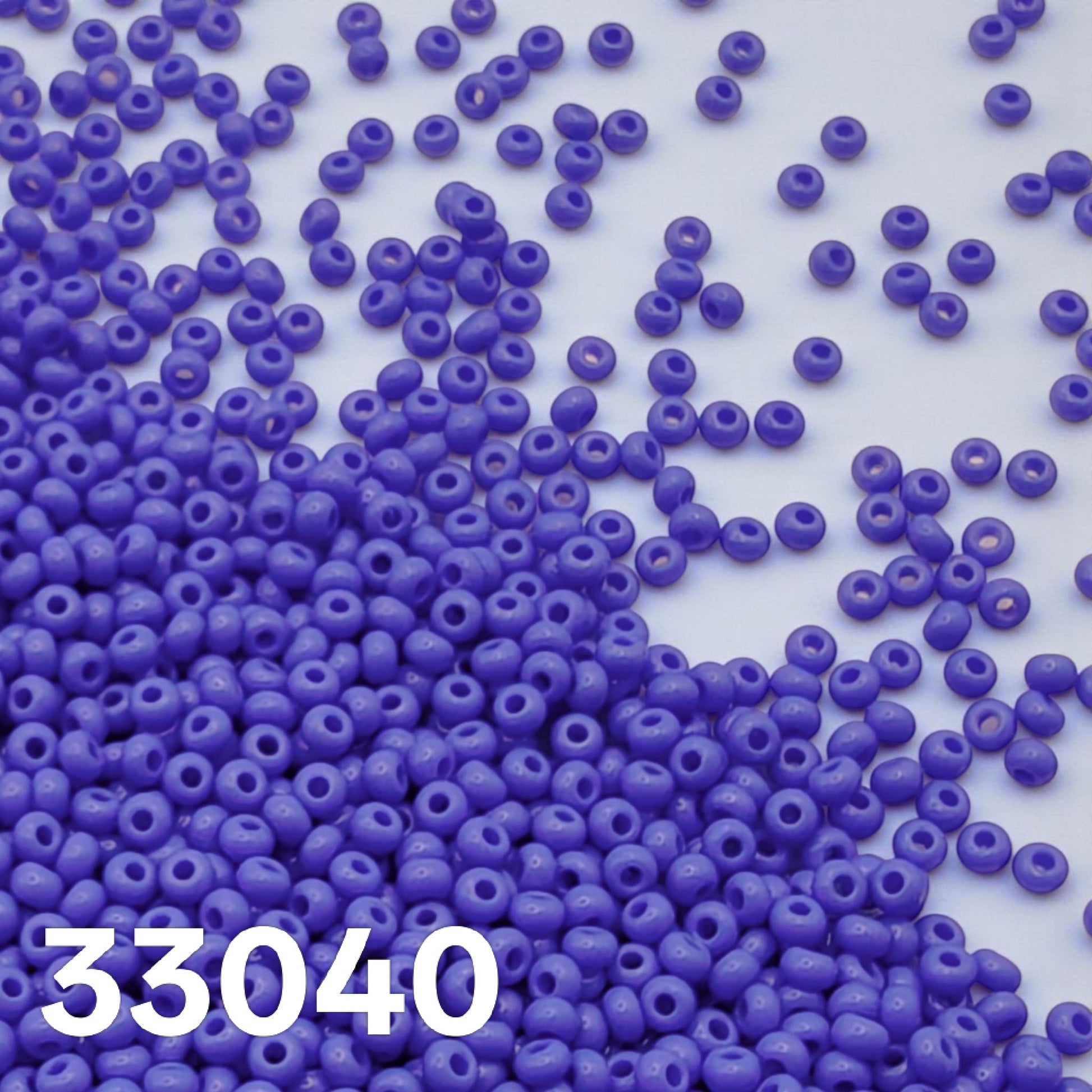 Preciosa 33040 medium blue opaque beads for bead weaving and embroidery, flat lay