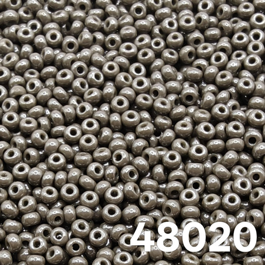 Preciosa Czech seed beads 10/0 Opaque Luster Grey 48020 — close-up of round glass beads for bead weaving and embroidery