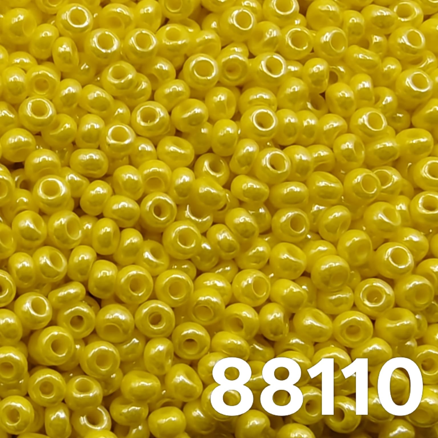 Preciosa Czech seed beads 10/0 Opaque Luster Light Yellow 88110 – round glass beads close-up