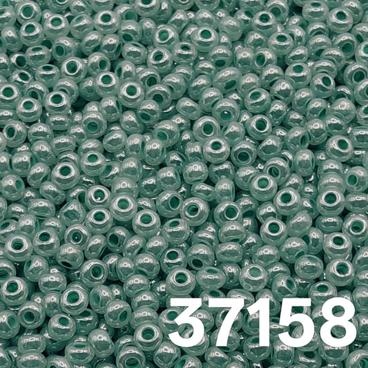 Preciosa Czech seed beads 10/0, Pearlized Green Ceylon, col. 37158 – close-up of uniform round glass beads