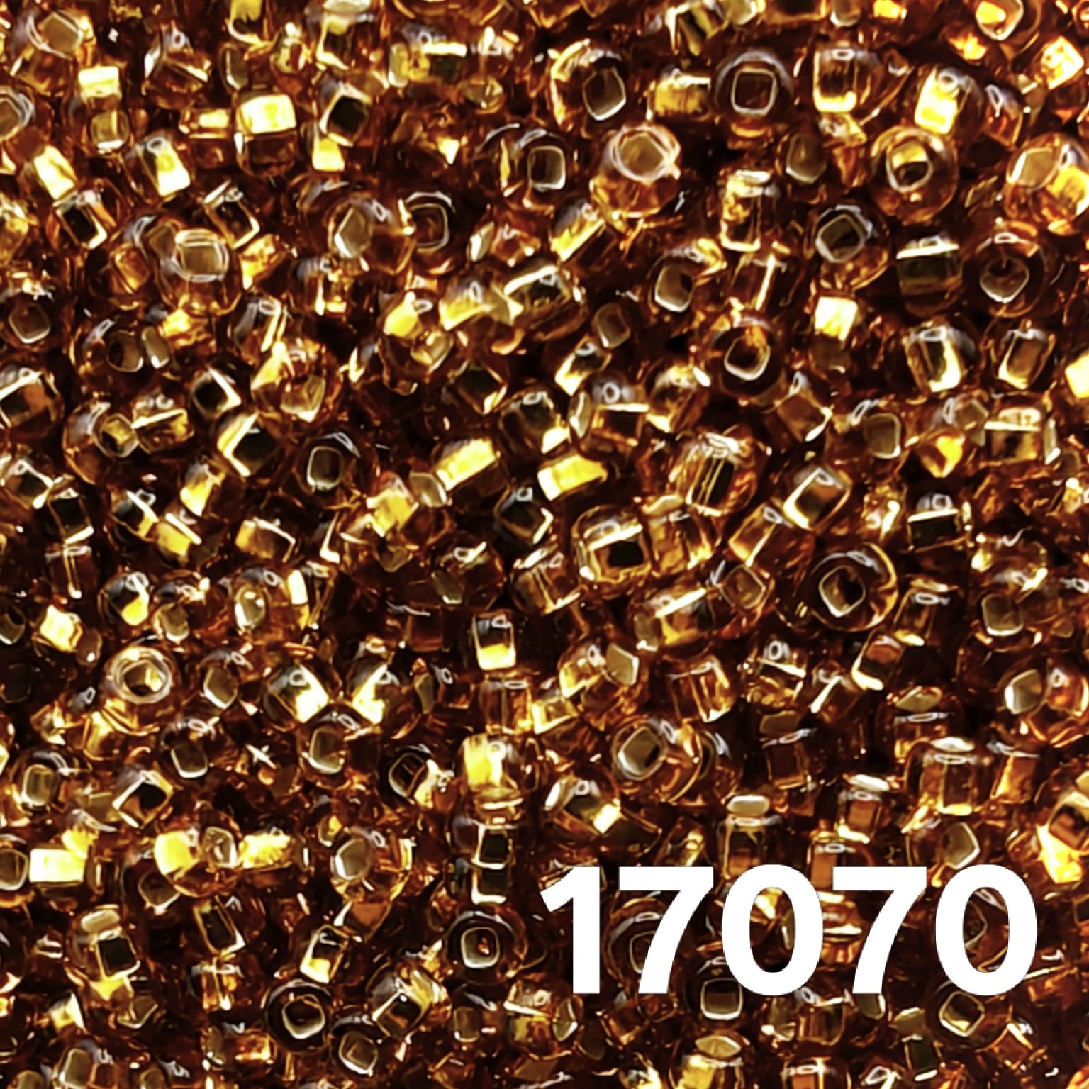 Preciosa Czech seed beads 10/0 Silverlined Topaz #17070 close-up