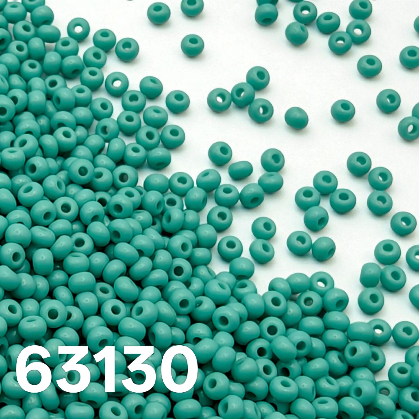 Preciosa Czech seed beads 10/0 opaque green turquoise 63130 close up