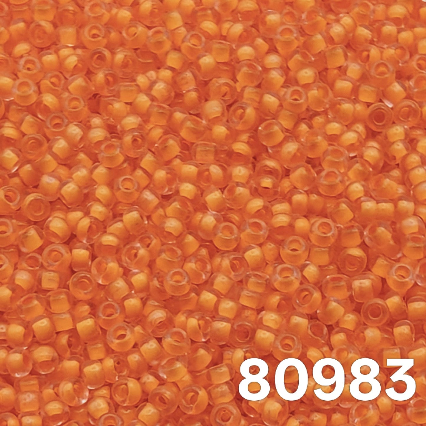 Preciosa seed beads 10/0 colourlined Dyed Terra Yellow Light Orange 80983 macro close-up