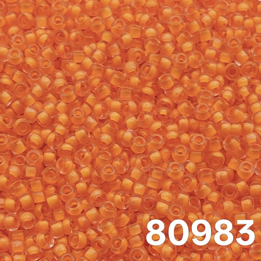 Preciosa seed beads 10/0 colourlined Dyed Terra Yellow Light Orange 80983 macro close-up