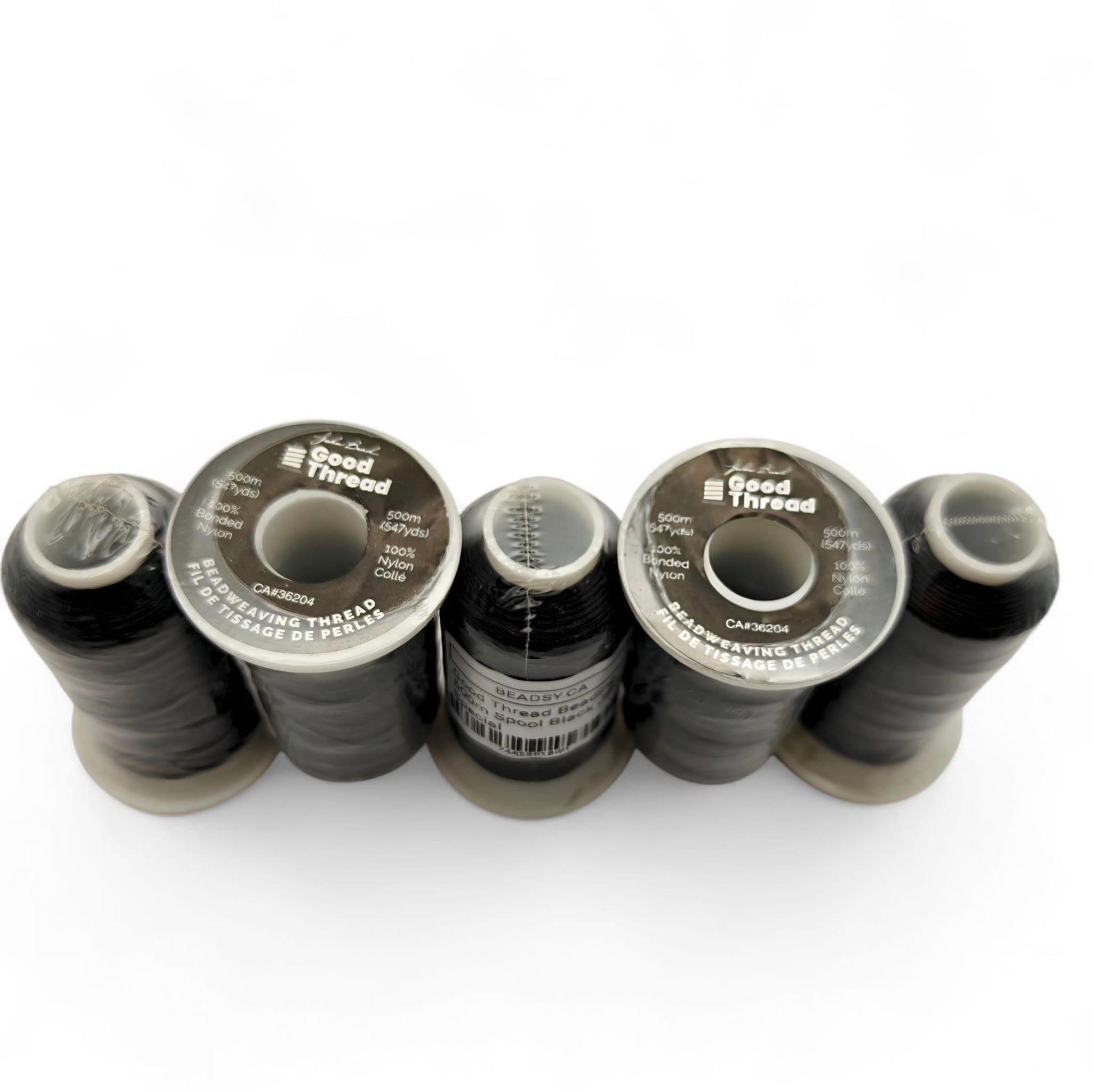 Row of Good Thread black bonded nylon beading thread spools, 500 m / 547 yds each for loom and off-loom beadwork